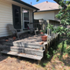 My old deck. The new one is practically identical in size and shape (it’s three feet wider along the house), but it’s using fake wood. Not hot pink or purple fake wood, brown fake wood.